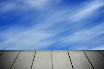 Blur blue sky with wooden plank background for web