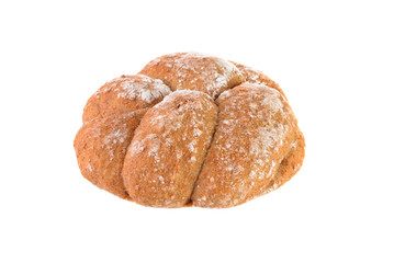 Close-up of a wholemeal  plaited bread on white background