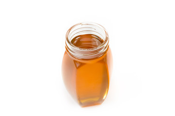 Little bottle filled with honey