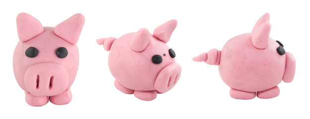 Set of pink pig made from plasticine