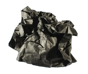 Black crumpled sheet of paper isolated on the white background