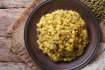 Rice with mung bean and spices close-up top view