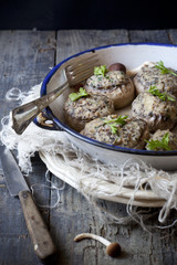 stuffed mushrooms on vintage enamelled tin