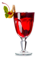 Glass of mulled wine with spices isolated on white