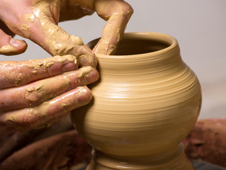 potter, creating an earthen jar