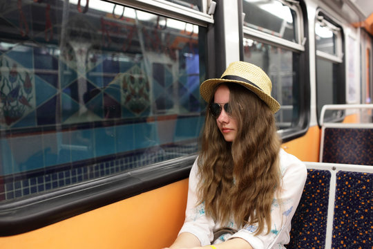 Teen in subway train