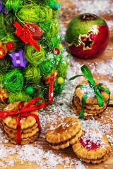 Christmas cookies on the background of decorated Christmas trees