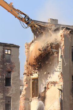 Demolition of the old building in the town
