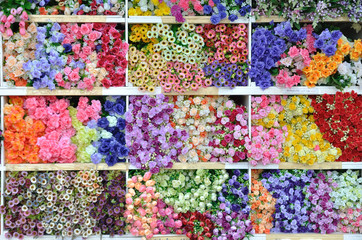 Many type of artificially flowers for background.