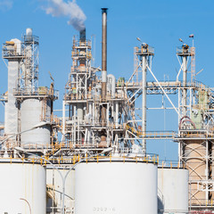 White smoke in the blue sky