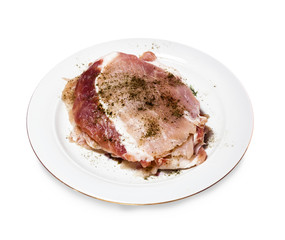 Prepared by frying the pieces of meat on a plate