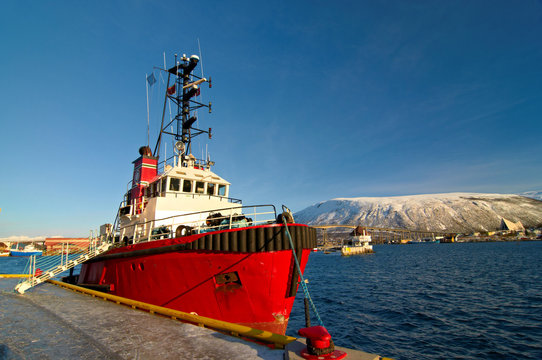 Norwegian fishing boat parked in a harbor in Tromso, Norway