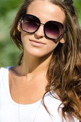 Teen Girl wearing sunglasses