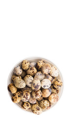 Quail eggs in a white bowl over white background 