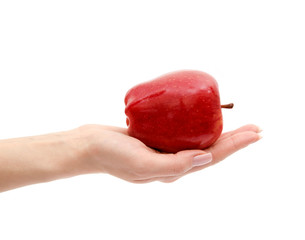 hand with an apple