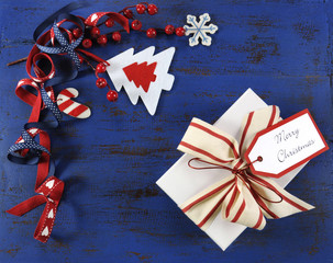 Christmas red white ornaments on dark blue vintage wood