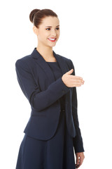 Obraz premium Businesswoman welcoming