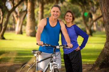 Happy fit elder couple at the park