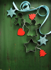 Christmas holiday background on dark green vintage wood