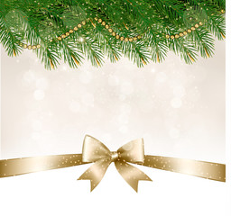 Christmas background with  branches of tree and bow with ribbons