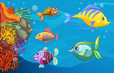 Obraz na płótnie Canvas A school of fish under the sea