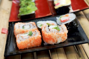 Japanese sushi - sushi egg, shrimp, crab stick, seaweed.