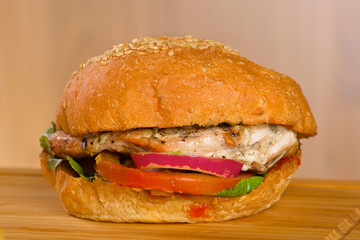 Tasty burger with melted cheese and thick succulent ground beef