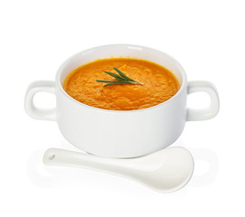 Pumpkin soup isolated on white background