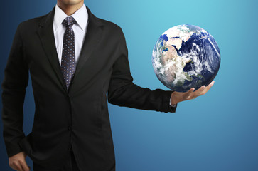 holding a glowing earth globe in his hands (NASA) globe in his h