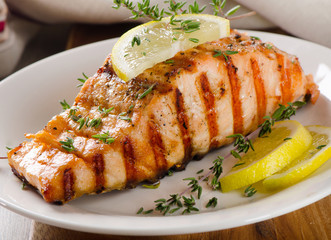 Grilled Salmon with lemon, olives and  thyme