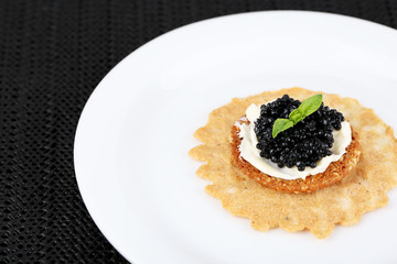 Black caviar with crispy bread