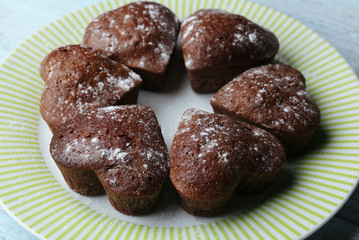 Fototapeta na wymiar Homemade chocolate cupcakes on table