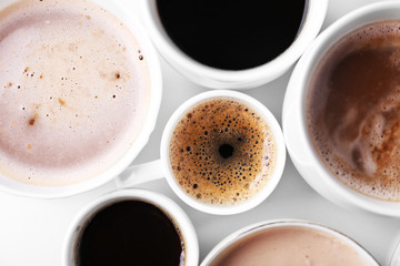 Lots of coffee cups on white background