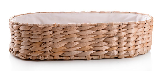 Empty wicker basket, isolated on white