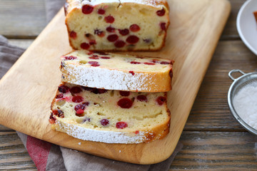 tasty cake with cranberry cutting