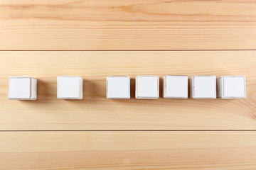 Educational cubes, on wooden background