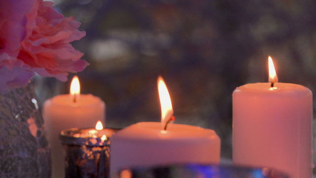 Flickering flame of candles, close-up