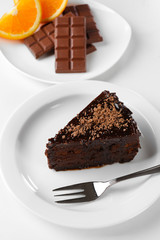 Yummy chocolate cake served on table