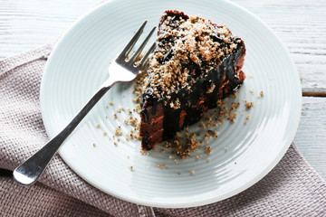 Yummy chocolate cake served on table, close-up