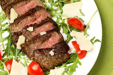 Grilled meat with tomatoes and cheese