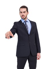 Cheerful businessman pointing at camera