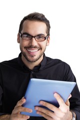 Smiling businessman in glasses holding tablet