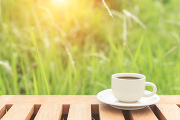 Coffee cup on the table in the morning