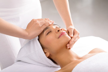 Receiving facial massage