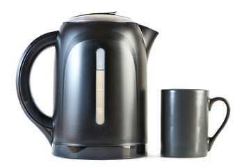 Modern kettle and cup isolated on white