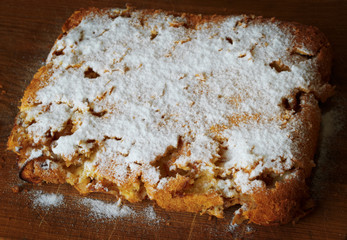 homemade apple pie, sprinkled with powdered sugar