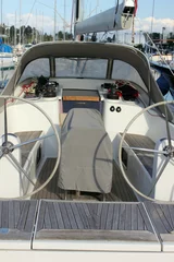 Fotobehang yacht cockpit with steering wheel © William Richardson
