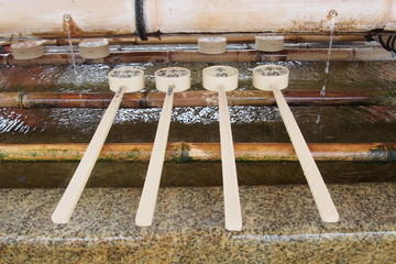 Ladle on the Traditional water well in Japan