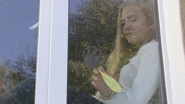 Sad tearful teenage girl says goodbye to her mother