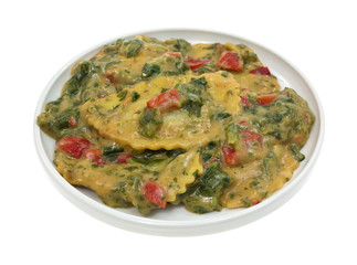 Serving of cooked ravioli in a small dish